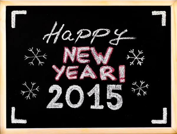 快乐新的一年到 2015 年，手用粉笔写在黑板上，在黑色背景下，老式的概念分离 — 图库照片