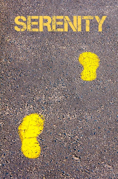 Yellow footsteps on sidewalk towards Serenity message — Stock Photo, Image
