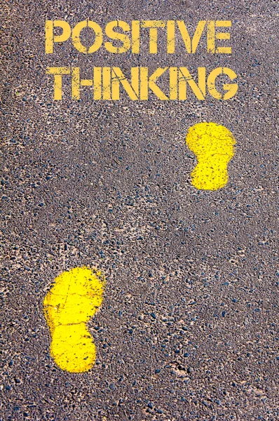 Yellow footsteps on sidewalk towards Positive Thinking message — Stock Photo, Image