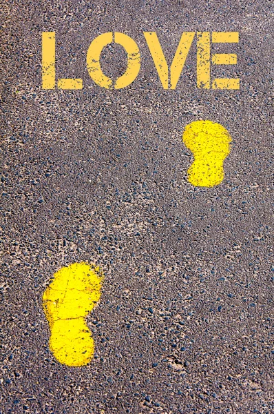 Yellow footsteps on sidewalk towards Property Investment message — Stock Photo, Image