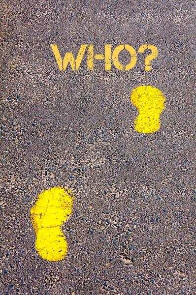 Yellow footsteps on sidewalk towards Who message — Stock Photo, Image