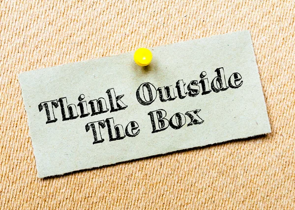 Recycled paper note pinned on cork board.Think Outside the Box Message. Concept Image — Stock Photo, Image