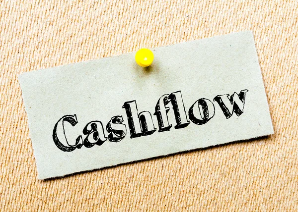 Gerecycleerd papier opmerking vastgemaakt aan kurk boord. Cashflow bericht — Stockfoto