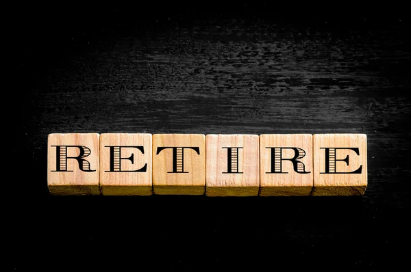 Ordet pension isolerad på svart bakgrund — Stockfoto