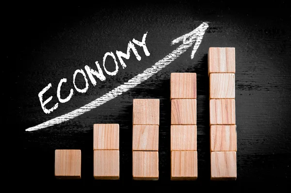 Word economie op de pijl boven staafdiagram oplopend — Stockfoto