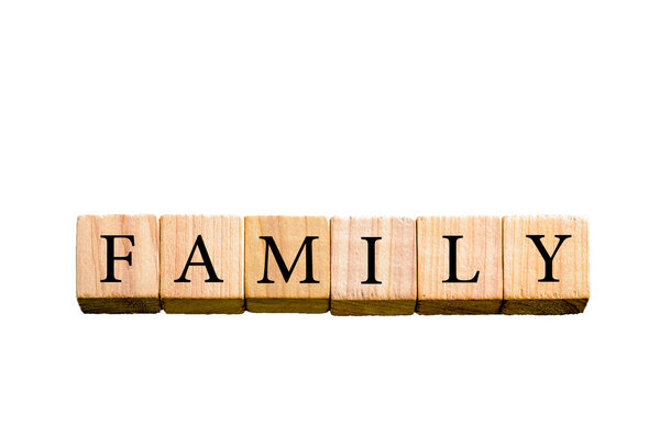 Word FAMILY. Wooden small cubes with letters isolated on white background with copy space available. Concept image.