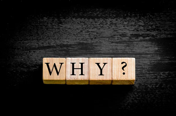 Word WHY isolated on black background with copy space — Stock Photo, Image