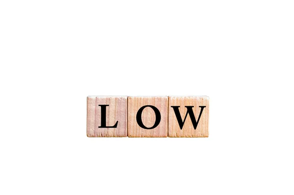 Слово LOW изолировано на белом фоне с копировальным пространством — стоковое фото