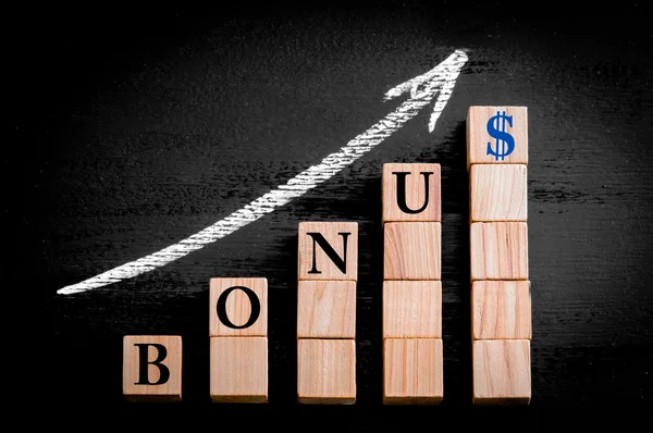 Word BONUS on ascending arrow above bar graph — Stock Photo, Image