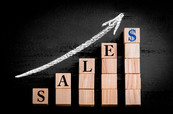 Word SALES on ascending arrow above bar graph — Stock Photo, Image