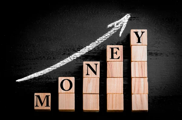 Word MONEY on ascending arrow above bar graph — Stock Photo, Image