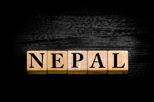 Word NEPAL isolated on black background — Stock Photo, Image