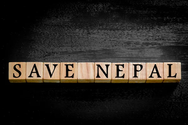 Message SAVE NEPAL isolated on black background — Stock Photo, Image