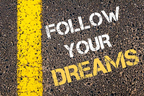 FOLLOW YOUR DREAMS motivational quote. — Stock Photo, Image