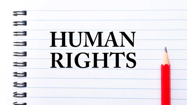 Human Rights Text written on notebook page — Stock Photo, Image