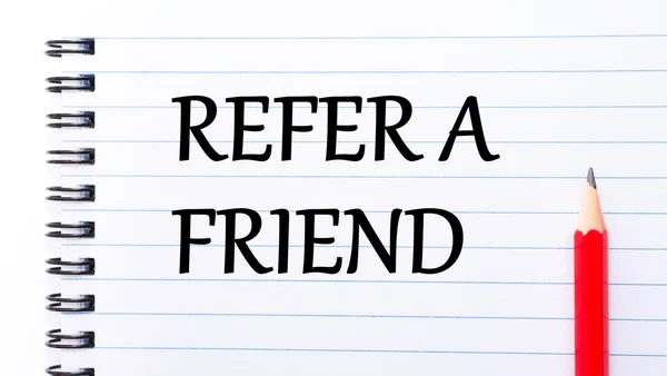 Refer a Friend Text written on notebook page — Stock Photo, Image