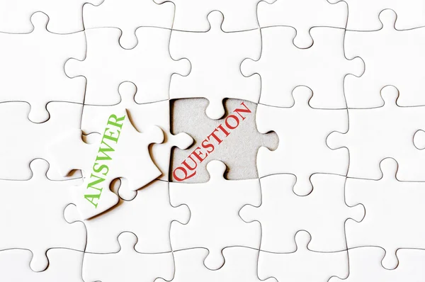 Missing jigsaw puzzle piece with word ANSWER — Stock Photo, Image