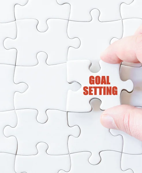 Last puzzle piece with words  GOALS SETTING — Stock Photo, Image