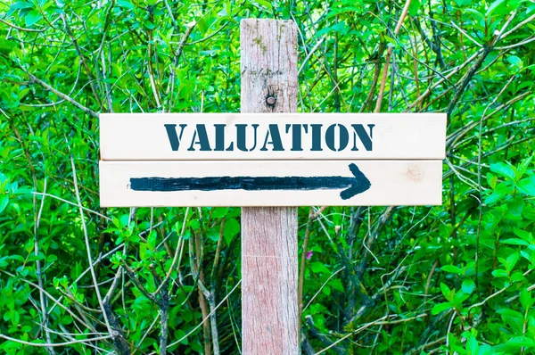 VALUATION Directional sign — Stock Photo, Image