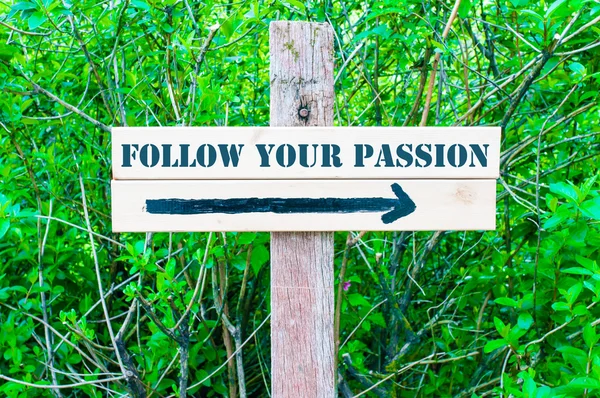 FOLLOW YOUR PASSION Directional sign — Stock Photo, Image