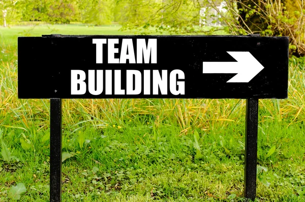 TEAM BUILDING written on directional black metal sign — Stock Photo, Image