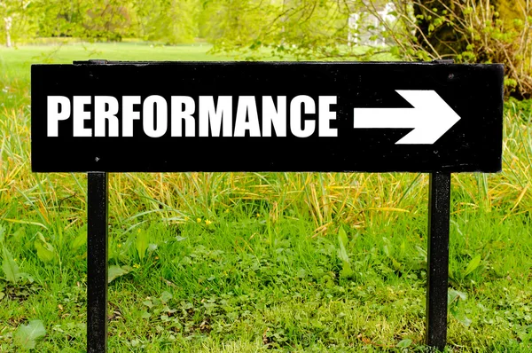 PERFORMANCE written on directional black metal sign — Stock Photo, Image