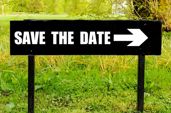 SAVE THE DATE written on directional black metal sign — Stock Photo, Image