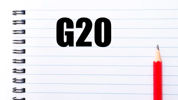 Palavra G20 escrito na página do caderno — Fotografia de Stock