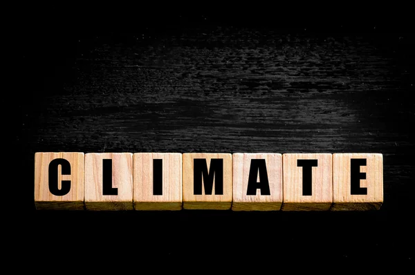 Word CLIMATE isolated on black background — Stock Photo, Image