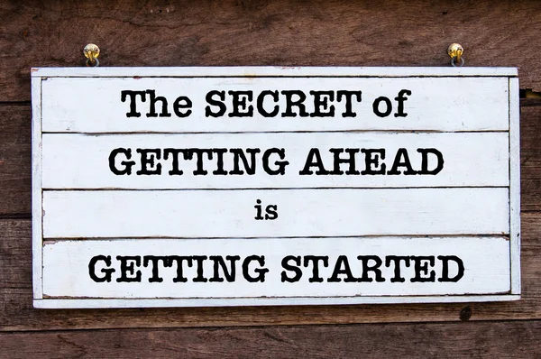 Inspirational message - The Secret Of Getting Ahead Is Getting Started — Stok fotoğraf