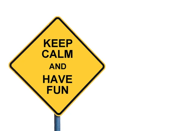 Yellow roadsign with KEEP CALM and Have FUN message — стоковое фото