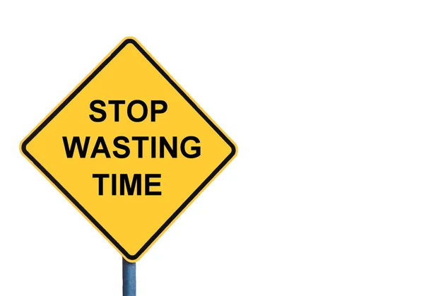 Panneau jaune avec message STOP WASTING TIME — Photo