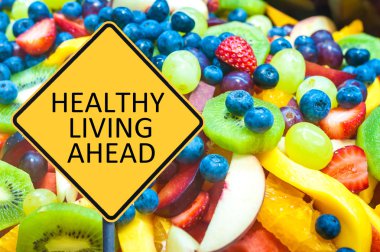 Yellow roadsign with message HEALTHY LIVING AHEAD