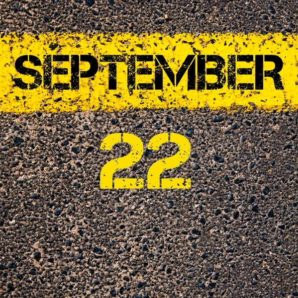 22 September kalenderdag over weg markering gele verf lijn — Stockfoto