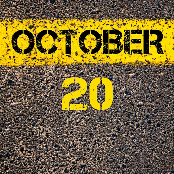 20 Octobre jour calendrier sur marquage routier ligne de peinture jaune — Photo