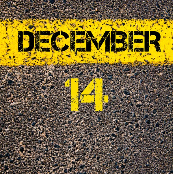 14 Diciembre día calendario sobre la carretera marcando línea de pintura amarilla —  Fotos de Stock