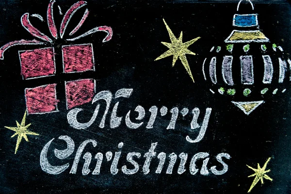 メリー クリスマス メッセージ、手描きのシンボルとビンテージの黒板 — ストック写真