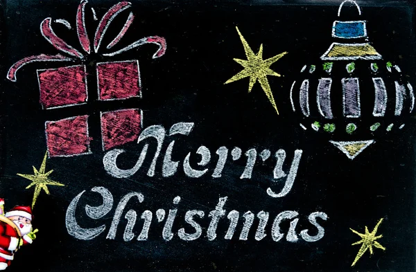 Tableau noir vintage avec message de Joyeux Noël et Père Noël, symboles de dessin à la main — Photo