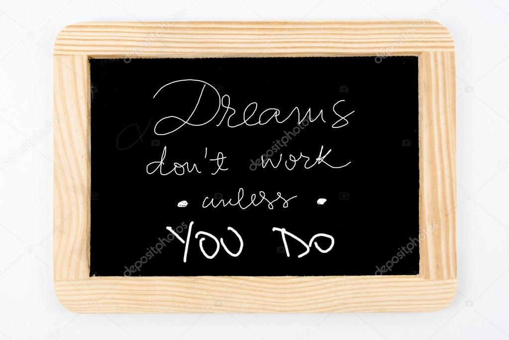 Dreams don't work unless you do message hand written on Vintage Chalkboard with wooden frame isolated on white