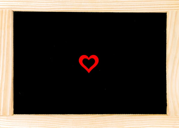 Ξύλινο πλαίσιο vintage Μαυροπίνακας με κόκκινη καρδιά σχήμα σύμβολο — Φωτογραφία Αρχείου