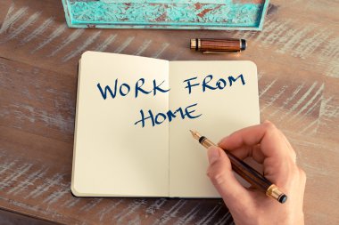 Motivational concept with handwritten text WORK FROM HOME