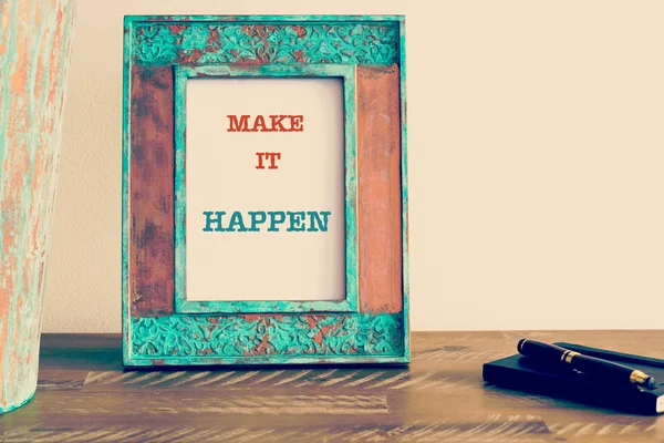 Motivational quote written on vintage photo frame MAKE IT HAPPEN — 스톡 사진
