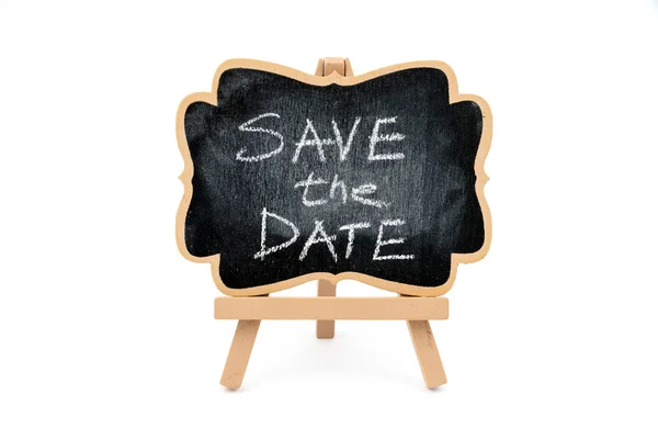 Wooden easel mini blackboard, text SAVE THE DATE — Stock Photo, Image