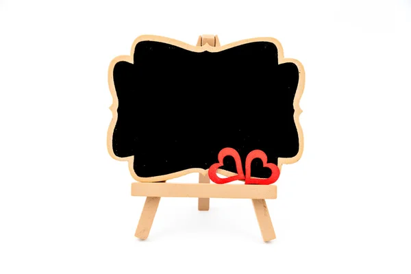 Houten ezel mini blackboard, lege ruimte voor tekst — Stockfoto