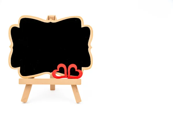 Houten ezel mini blackboard, lege ruimte voor tekst — Stockfoto