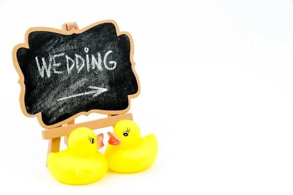 Wooden easel mini board, text WEDDING — стоковое фото