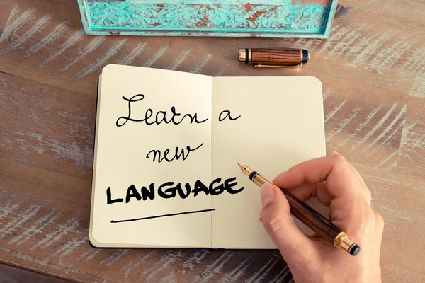 Handgeschriebener Text lernt eine neue Sprache — Stockfoto