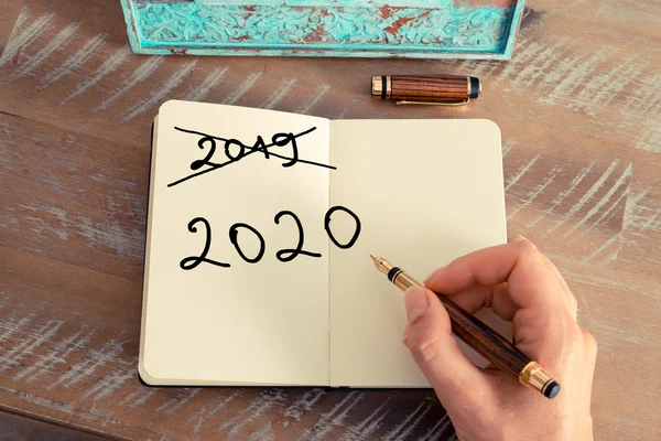 Handwritten text Happy New Year 2020 — Stock Photo, Image