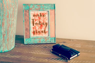 Vintage photo frame with motivational text