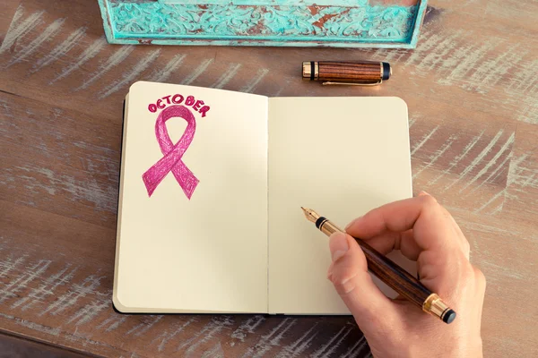 Pink ribbon as breast cancer awareness symbol — Stock Photo, Image